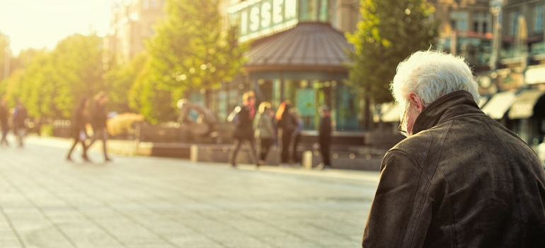 elderly man sitting in one of the best Philadelphia neighborhoods for active seniors
