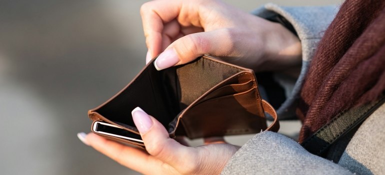 looking at an empty wallet