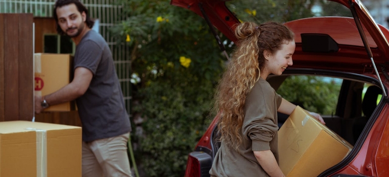 couple loading car