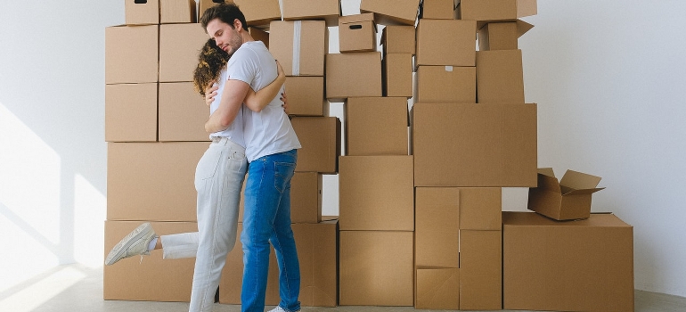 couple hugging before moving