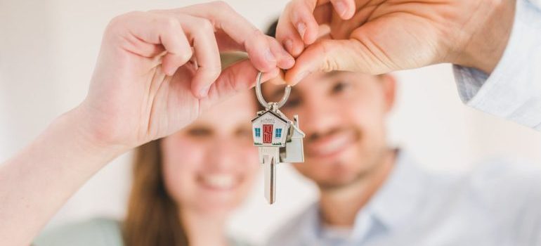 couple holding keys